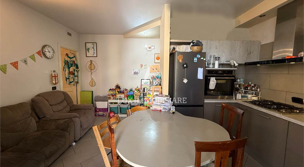 Sala con cucina a vista