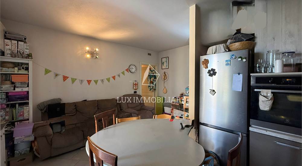 Sala con cucina a vista